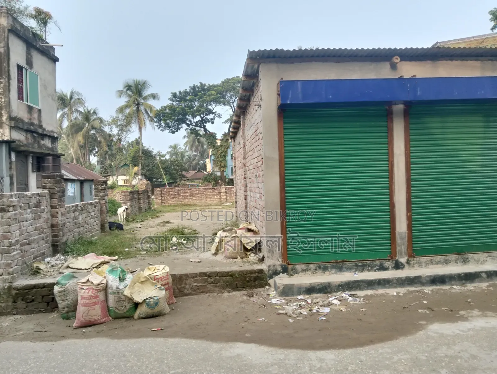 Land filled with soil suitable for building a house, sold with boundary and shop