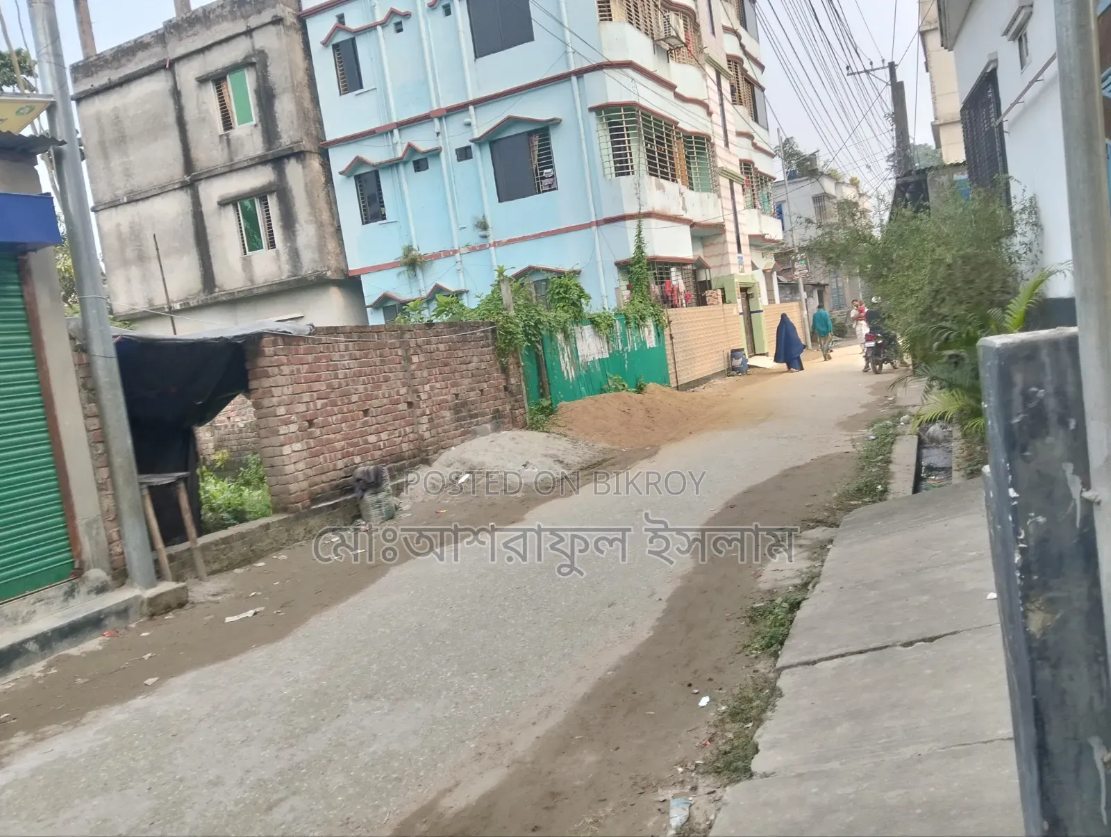 Land filled with soil suitable for building a house, sold with boundary and shop