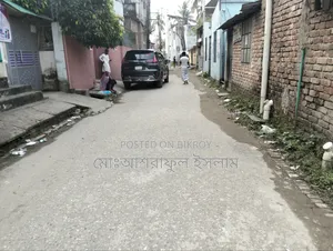 Land filled with soil suitable for building a house, sold with boundary and shop