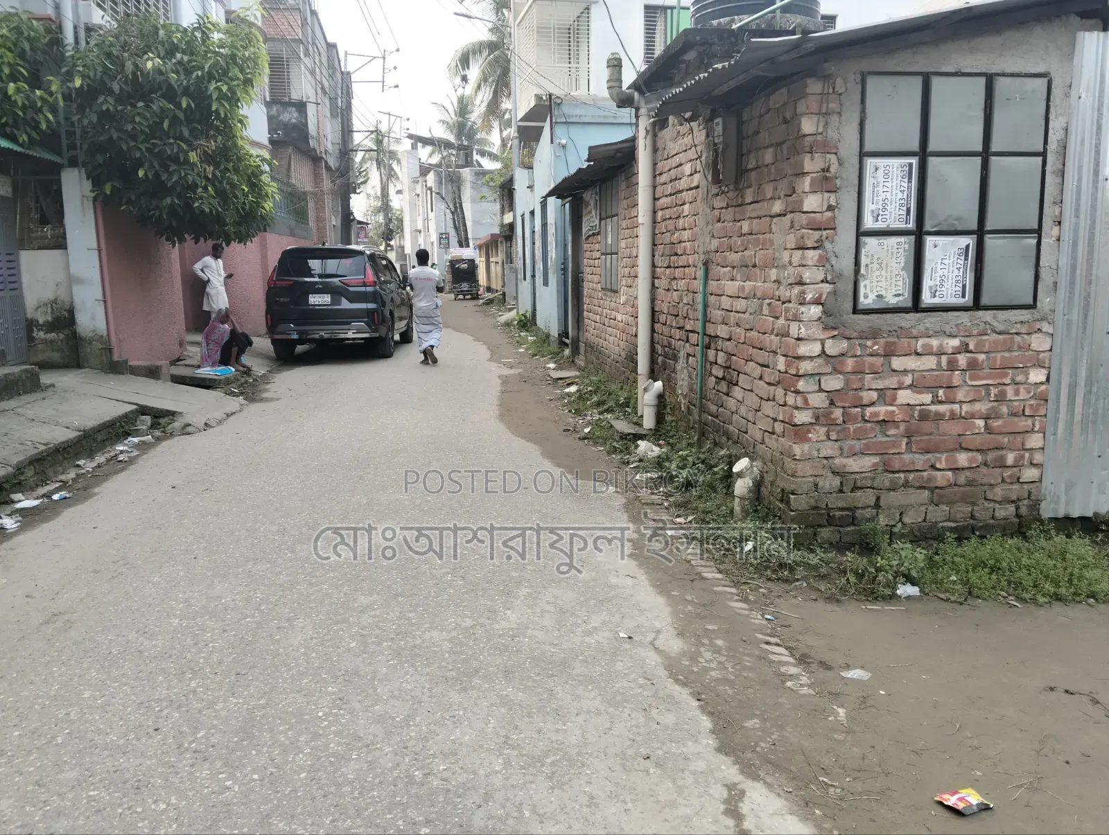 Land filled with soil suitable for building a house, sold with boundary and shop