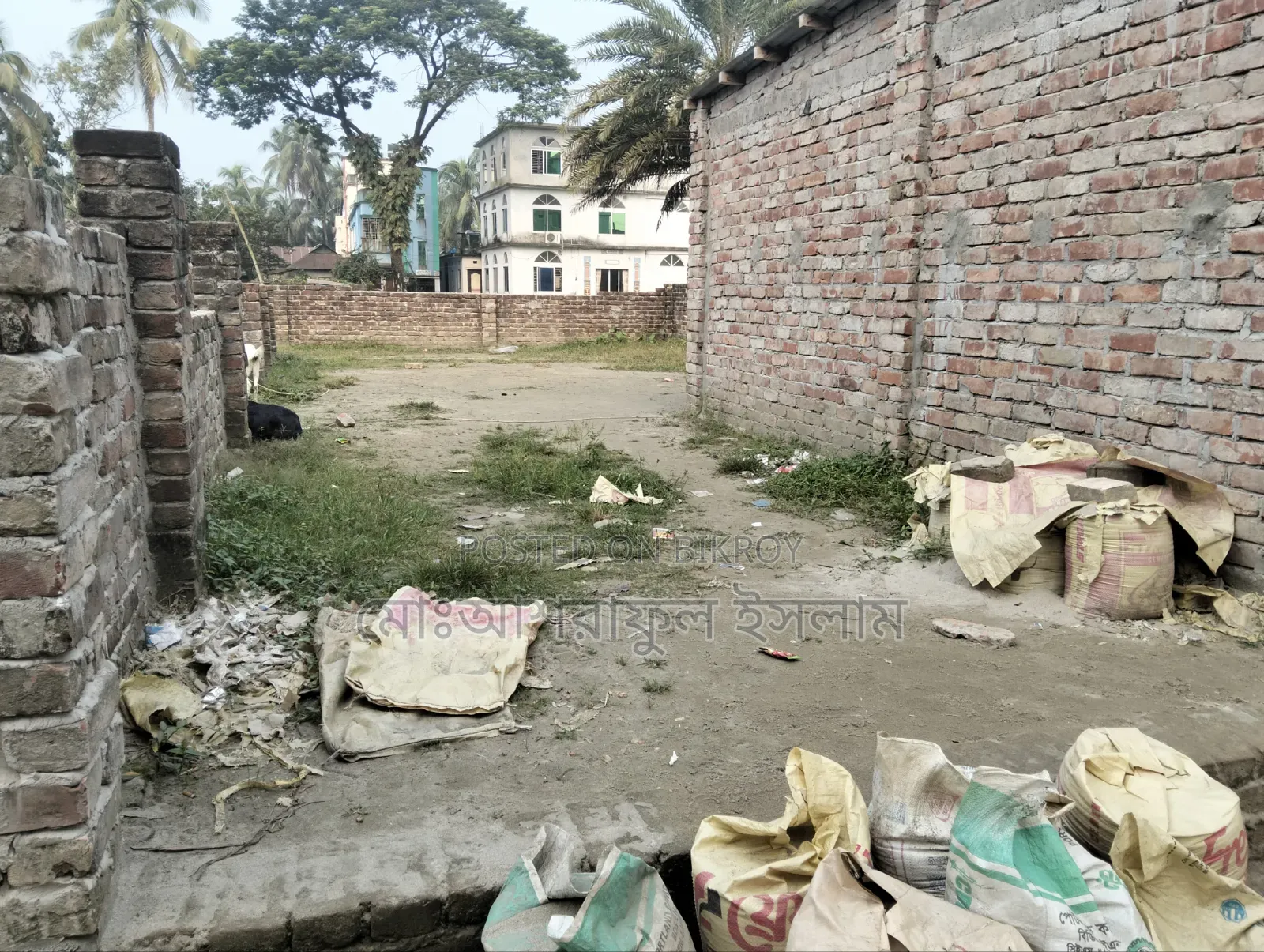 Land filled with soil suitable for building a house, sold with boundary and shop