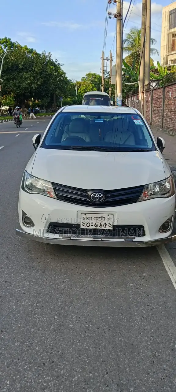 টয়োটা এক্সিও ২০১২ সাদা