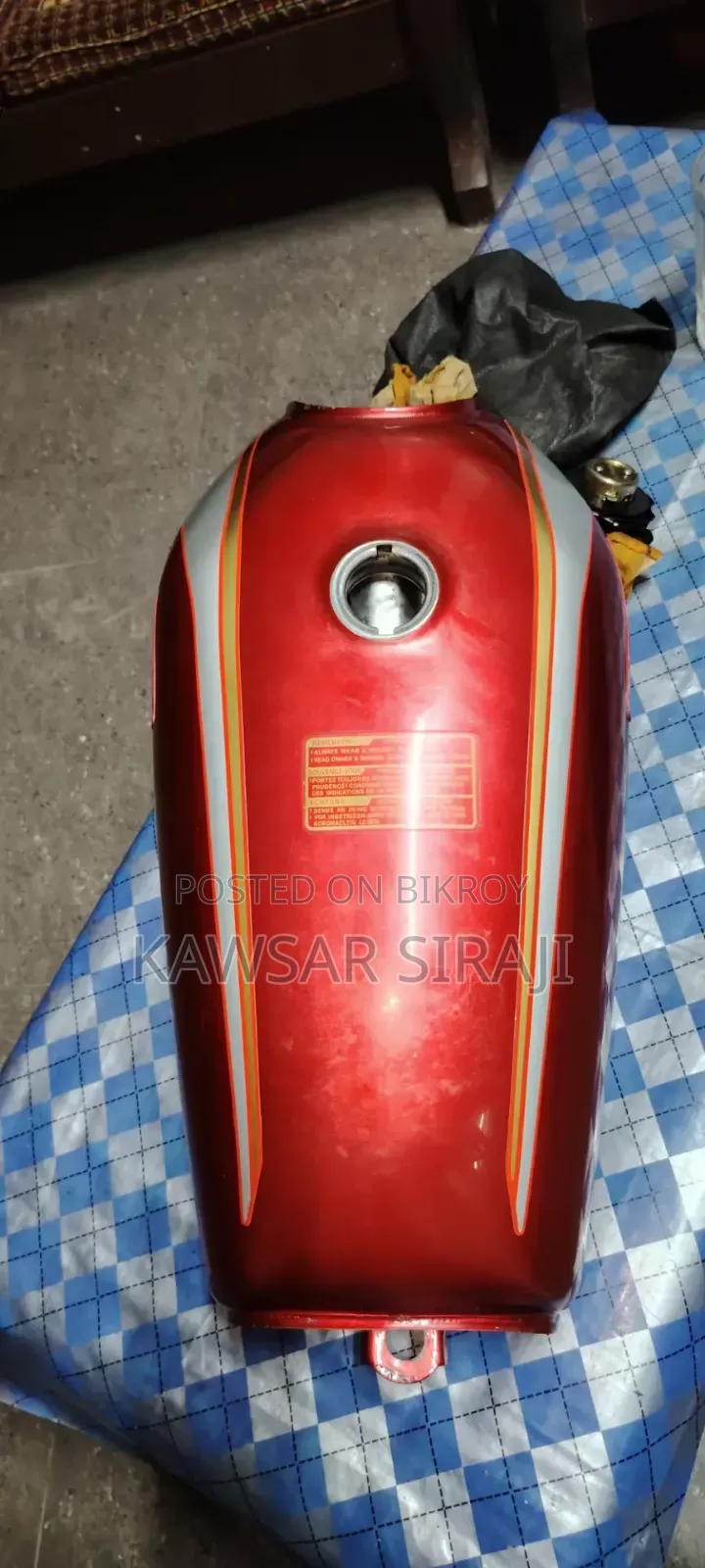 A red colored Freedom bike fuel tank for sale