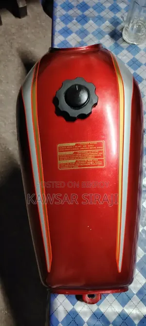 A red colored Freedom bike fuel tank for sale