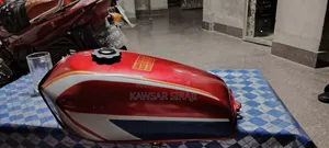A red colored Freedom bike fuel tank for sale