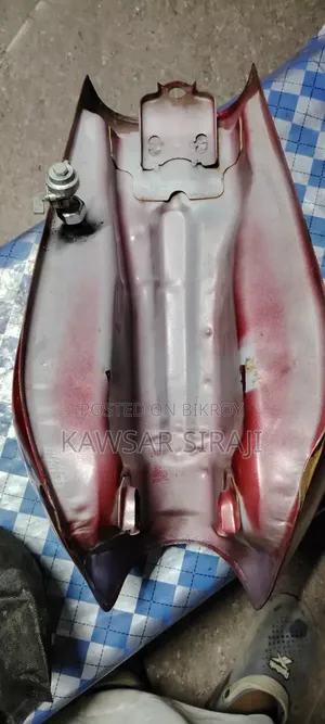 A red colored Freedom bike fuel tank for sale
