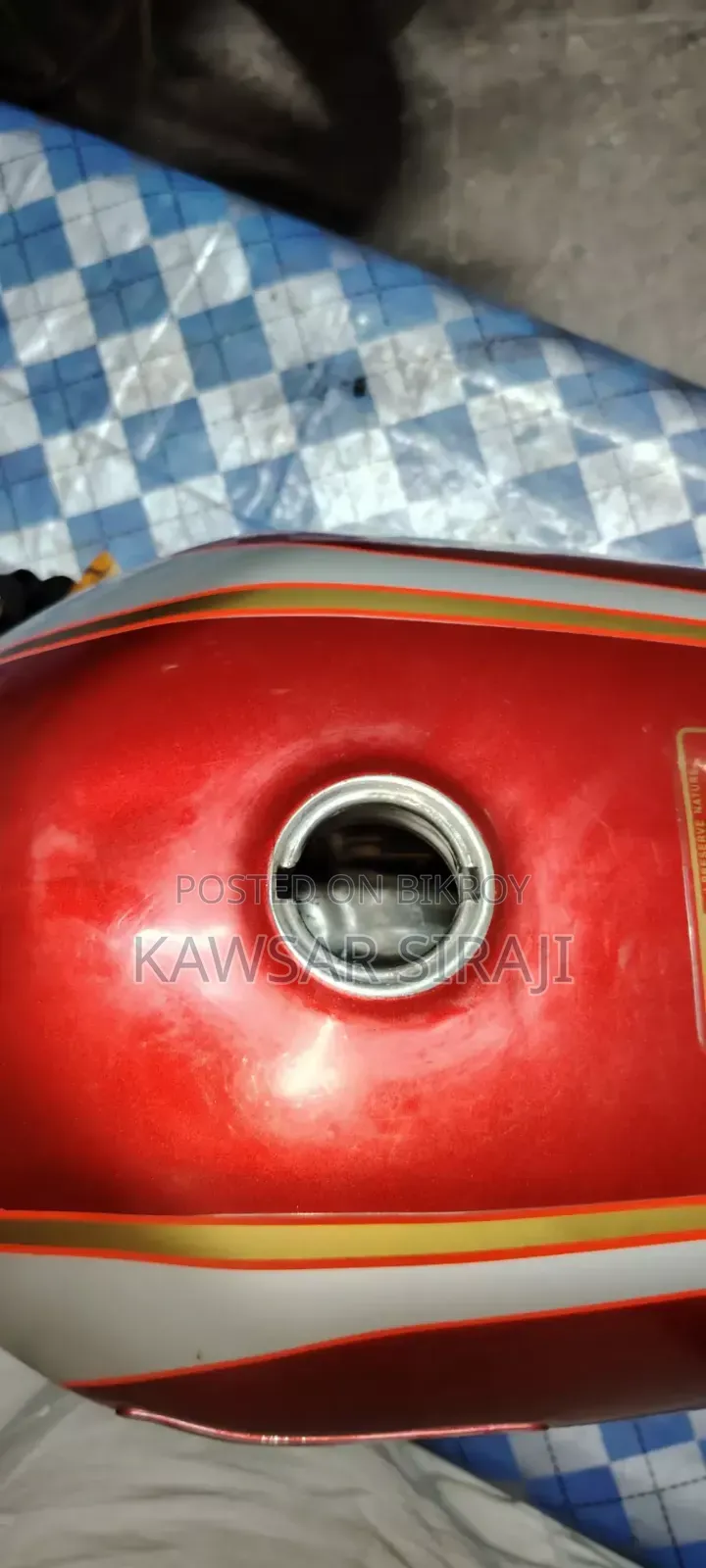 A red colored Freedom bike fuel tank for sale