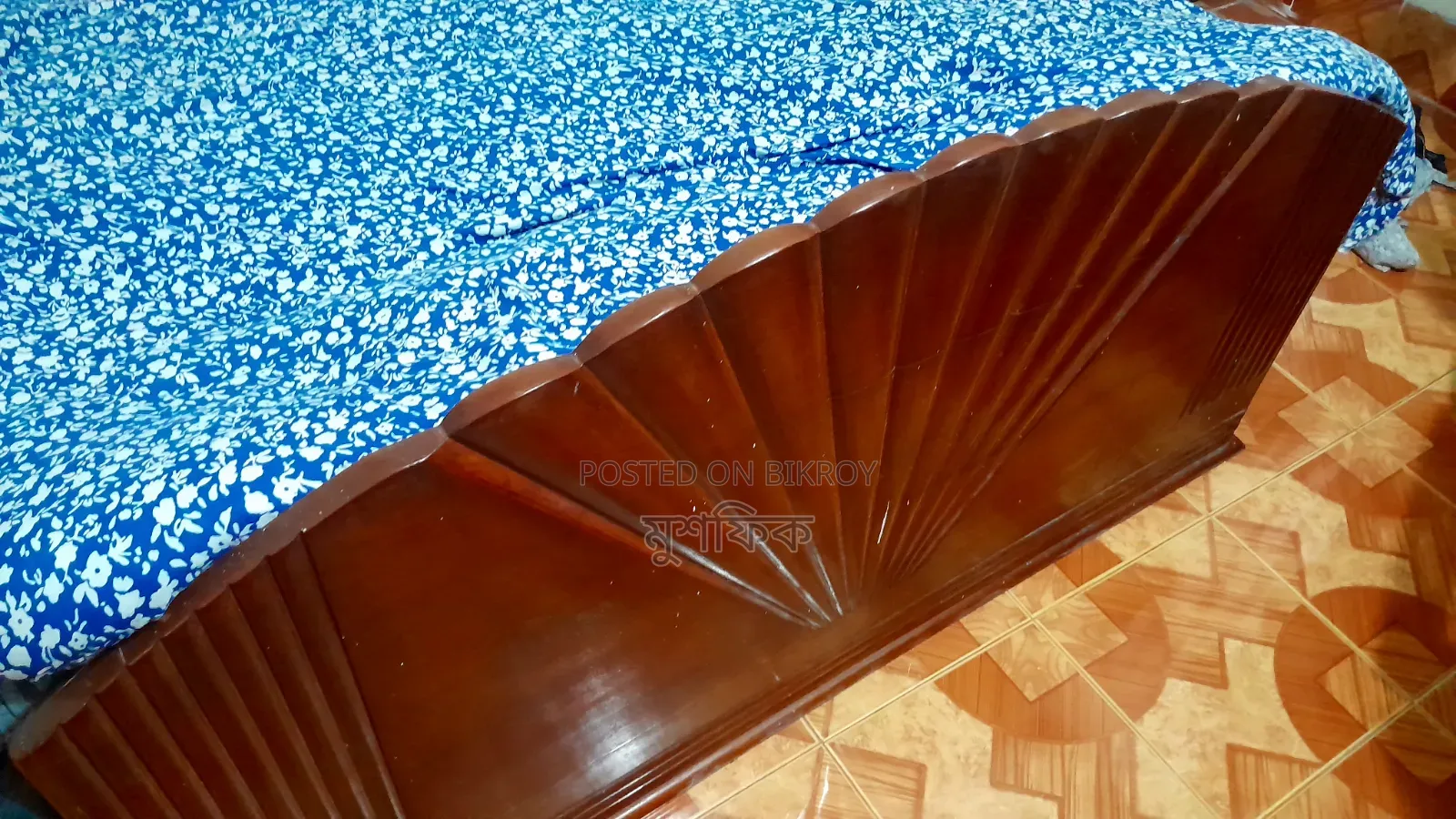 A genuine teak wood semi-double bed will be sold.