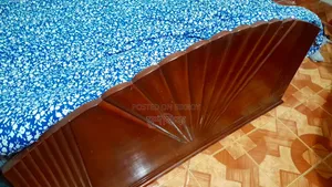 A genuine teak wood semi-double bed will be sold.