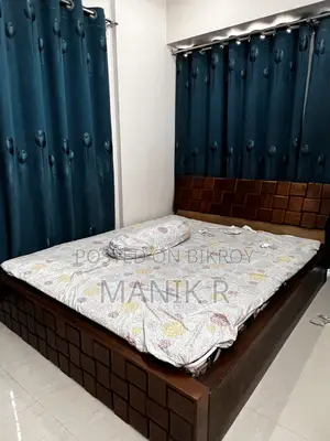 মজবুত কাঠের ডাবল খাট – প্রশস্ত ও স্টাইলিশ