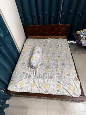 মজবুত কাঠের ডাবল খাট – প্রশস্ত ও স্টাইলিশ