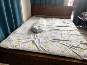 মজবুত কাঠের ডাবল খাট – প্রশস্ত ও স্টাইলিশ