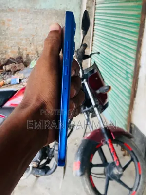 মোটর চলা এজ ৫০ নিও ২৫৬ জিবি নীল