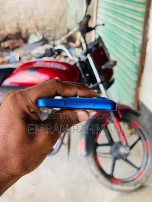 মোটর চলা এজ ৫০ নিও ২৫৬ জিবি নীল