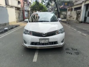 টয়োটা অ্যাক্সিও ১.৫ এক্স ২ডব্লিউডি ২০১৪ সাদা