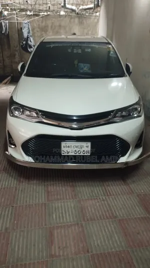 টয়োটা এক্সিও ১.৫ হাইব্রিড জি টু হুইল ড্রাইভ ২০১৯ সাদা