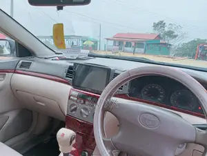 টয়োটা করোল্লা ২০০৪ হোয়াইট