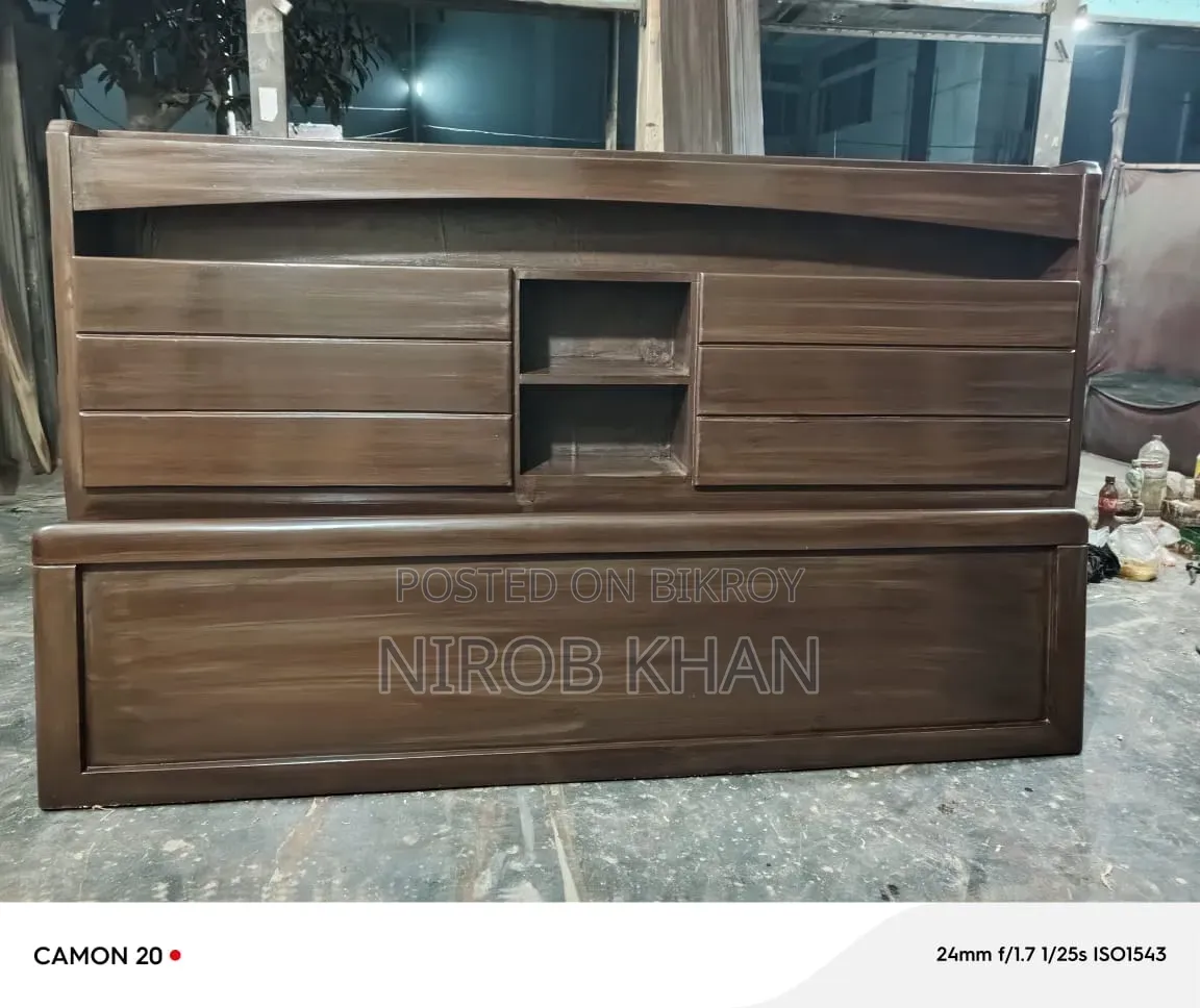 Bed 6/7 ft full box. Wood mahogany. Color just like the photo. 1 bed side table