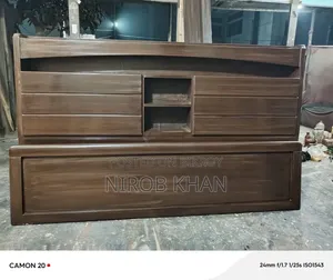 Bed 6/7 ft full box. Wood mahogany. Color just like the photo. 1 bed side table