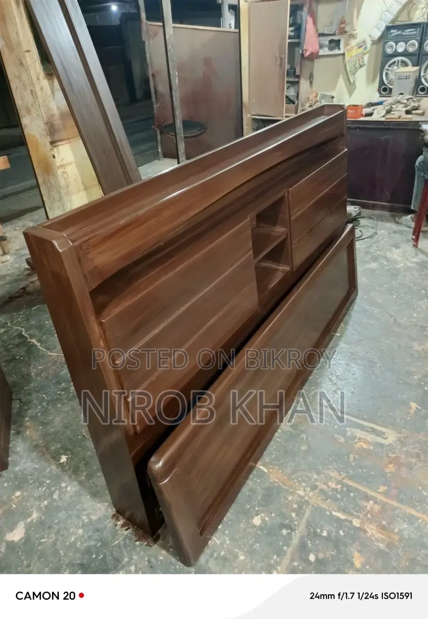 Bed 6/7 ft full box. Wood mahogany. Color just like the photo. 1 bed side table