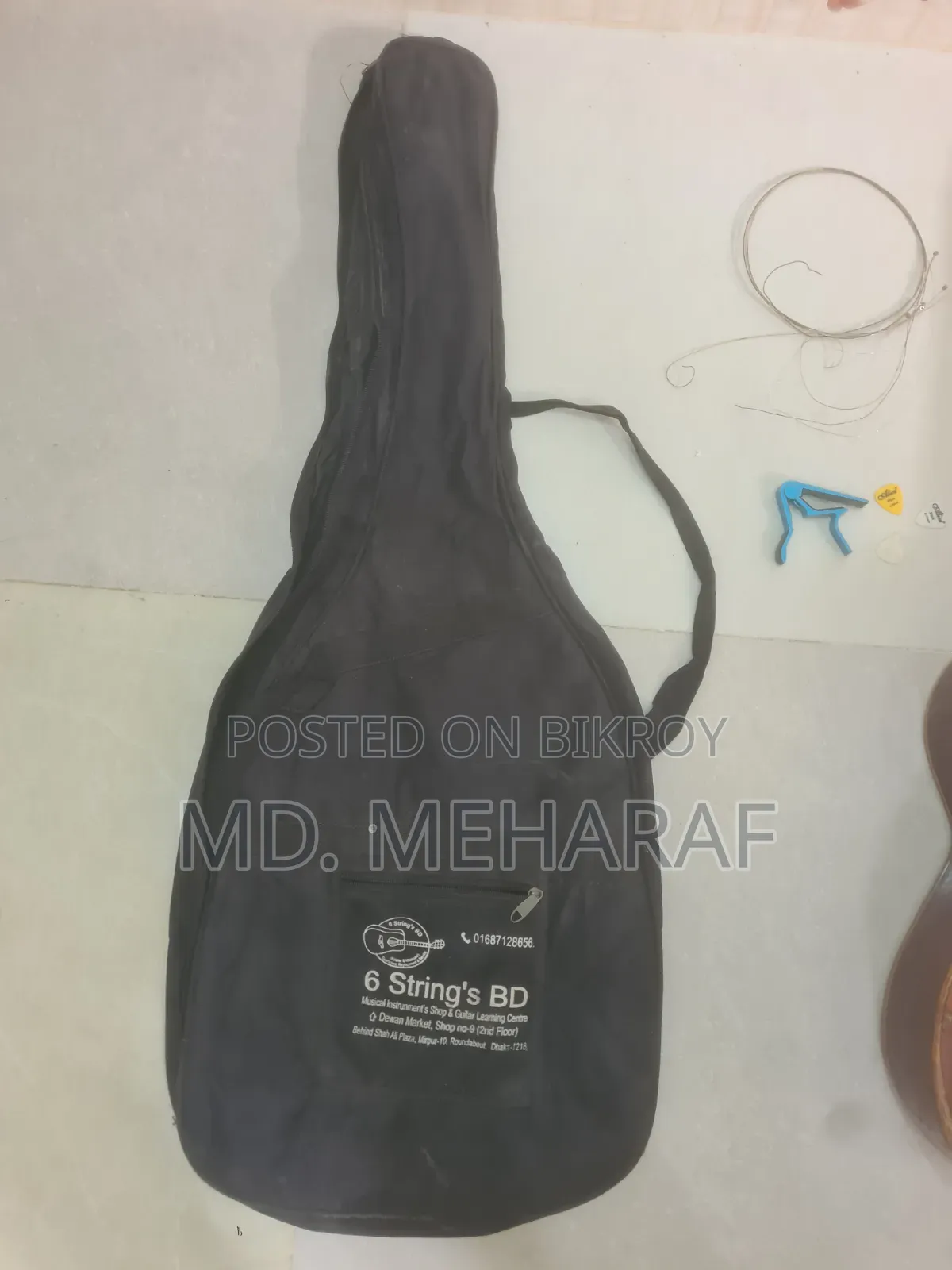 গিটার, ব্যাগ, ক্যাপো গিটারের শুধু ব্রিজ ফাটা