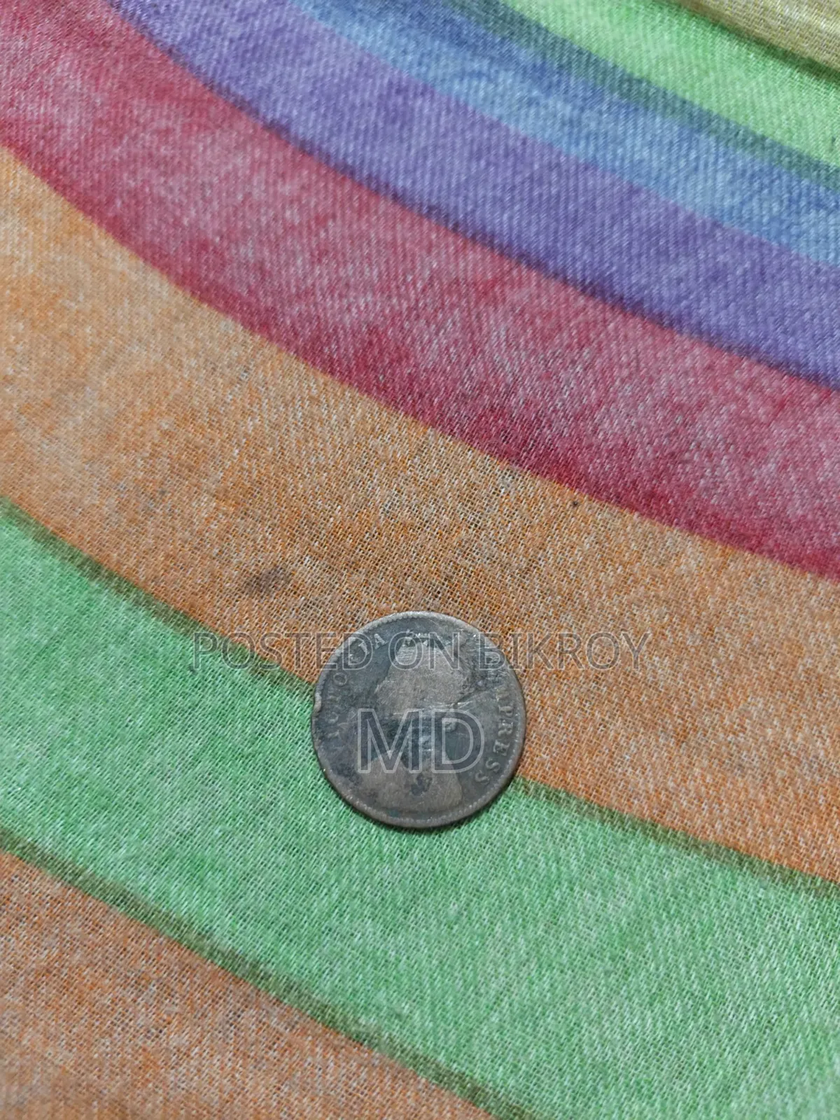 একটা ব্রিটিশ আমলের কয়েন