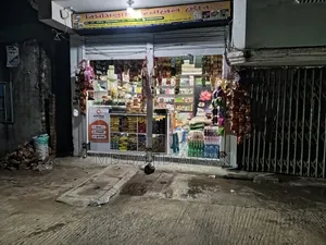 A running grocery shop is for sale