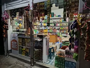A running grocery shop is for sale
