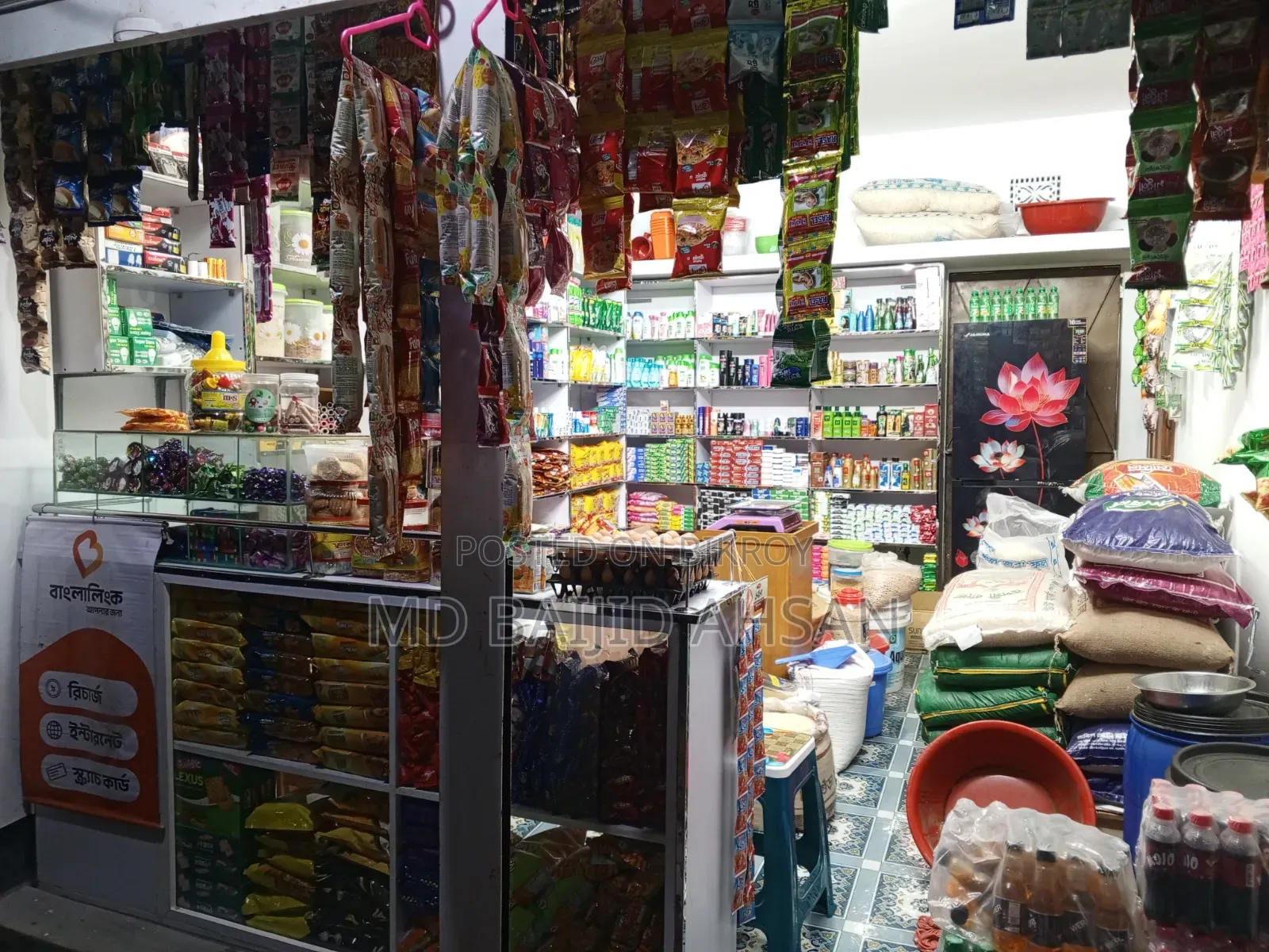 A running grocery shop is for sale