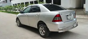 টয়োটা করোল্লা সেডান ২০০১ সিলভার