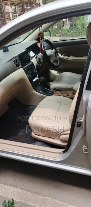 টয়োটা করোল্লা সেডান ২০০১ সিলভার