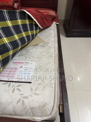 Used Bed. 5.5" by 6.5 feet. Mattress is included