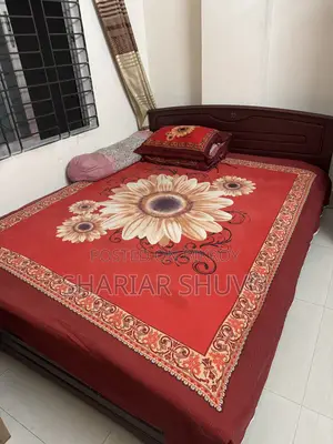 Used Bed. 5.5" by 6.5 feet. Mattress is included