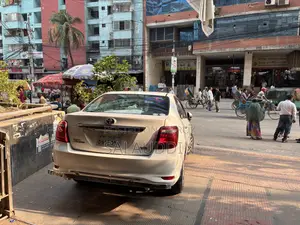 টয়োটা অ্যাক্সিও ২০১৬ হোয়াইট