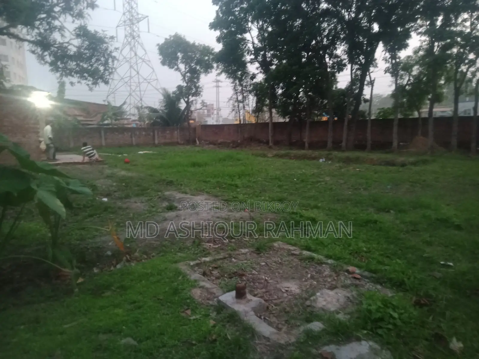An Open Land for Rent With Boundary & a House.