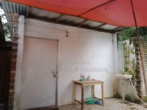 An Open Land for Rent With Boundary & a House.