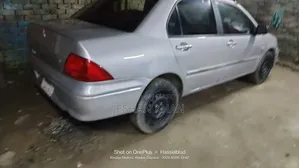 মিৎসুবিশি ল্যান্সার ২০০২ সিলভার