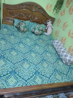 King size bed. Bed for sale with 5/6 hand mattress