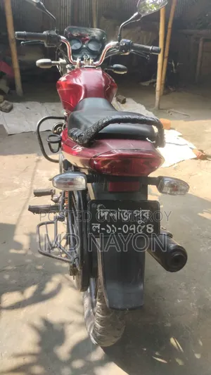 বাজাজ ডিসকভার ১৩৫ ২০০৯ লাল