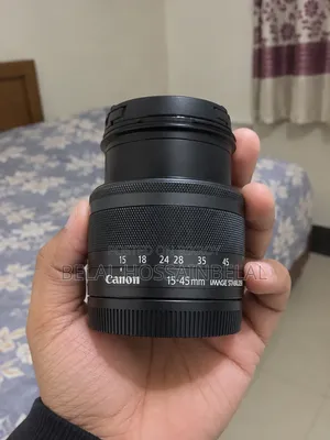 Canon 50 Mark 2 + 15/45mm Kit Lens + 50mm Lens + 2 Batteries