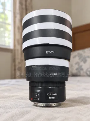 Canon 50 Mark 2 + 15/45mm Kit Lens + 50mm Lens + 2 Batteries
