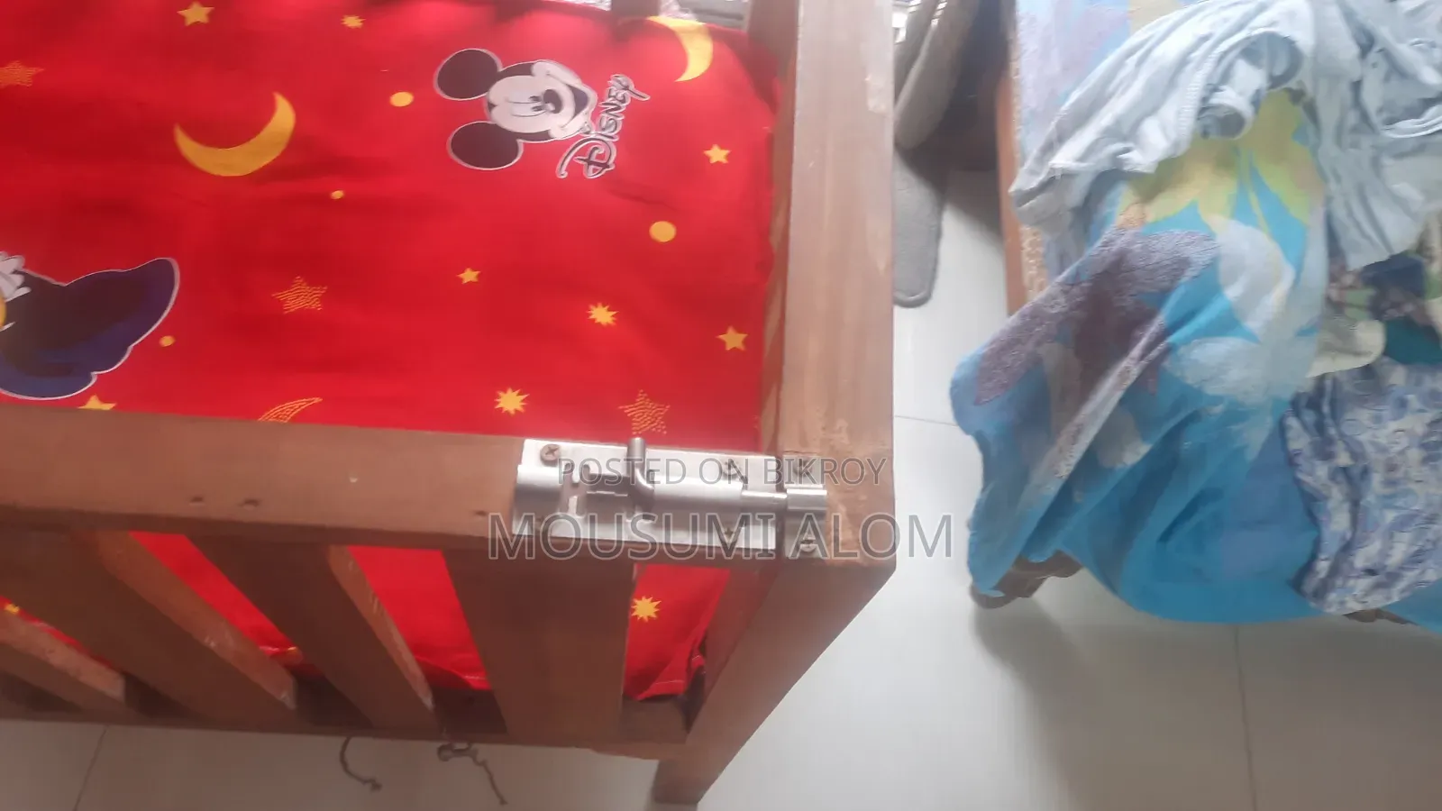 Wooden baby cot with mattress