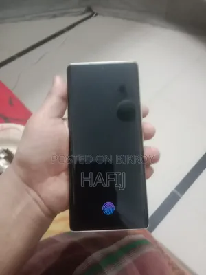 New Helio 128 GB Orange
