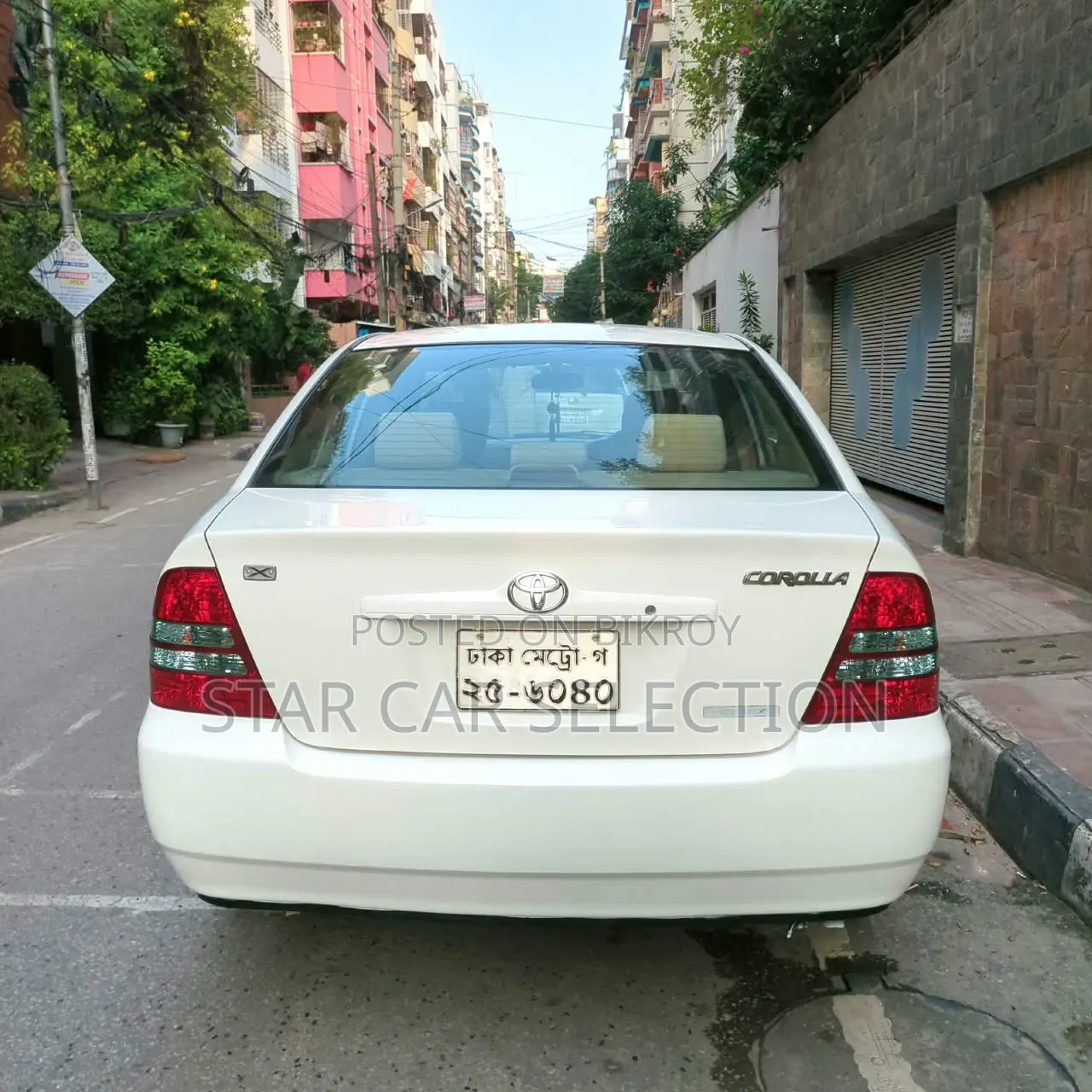 টয়োটা করোল্লা ২০০৪ সাদা