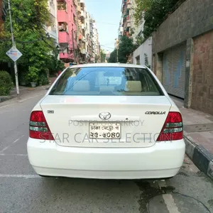 টয়োটা করোল্লা ২০০৪ সাদা