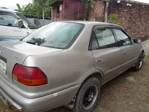 টয়োটা করোল্লা অটোমেটিক ১৯৯৫ বেগুনি