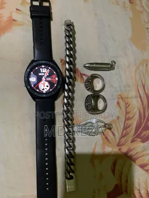 Some exclusive items for sale, watch, badge, ring, locket