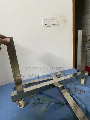 ভারি জিনিস সরানোর কাজ এর জন্য চাকা লাগানো স্টিল এর মেশিন