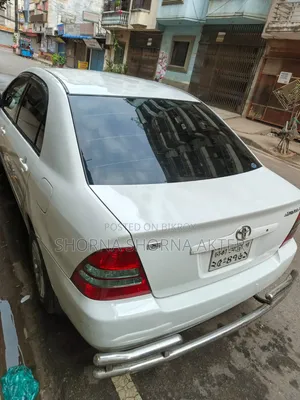 টয়োটা করোল্লা ২০০৩ সাদা