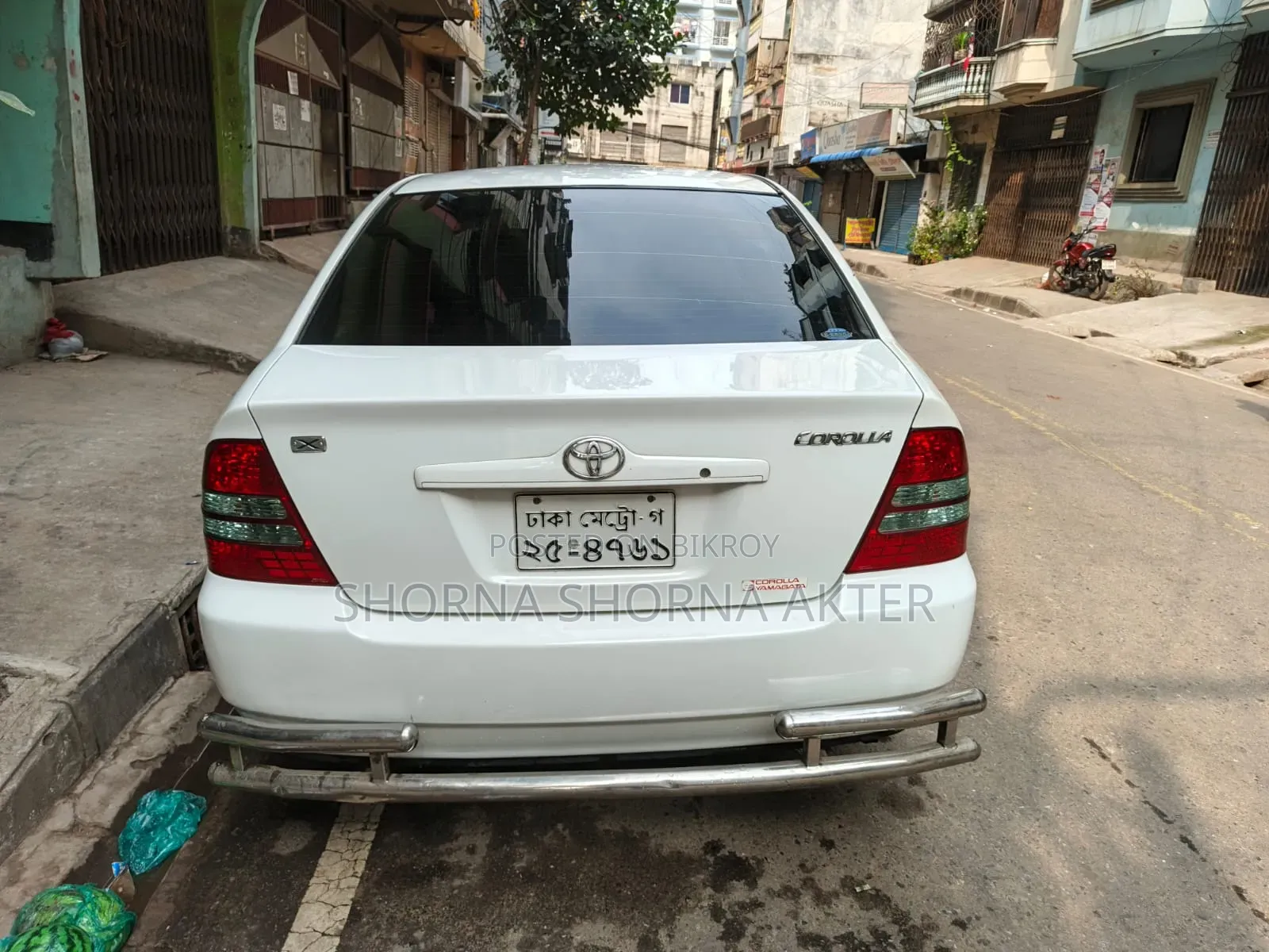 টয়োটা করোল্লা ২০০৩ সাদা